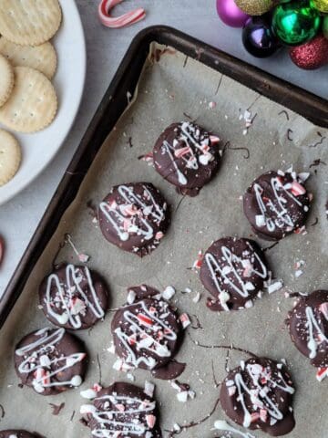 Ritz thin mint crackers recipe. Made gluten free with schar entertainment crackers, dipped in chocolate and coated with candy canes