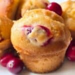 gluten free and dairy free cranberry orange muffins recipe with orange glaze.