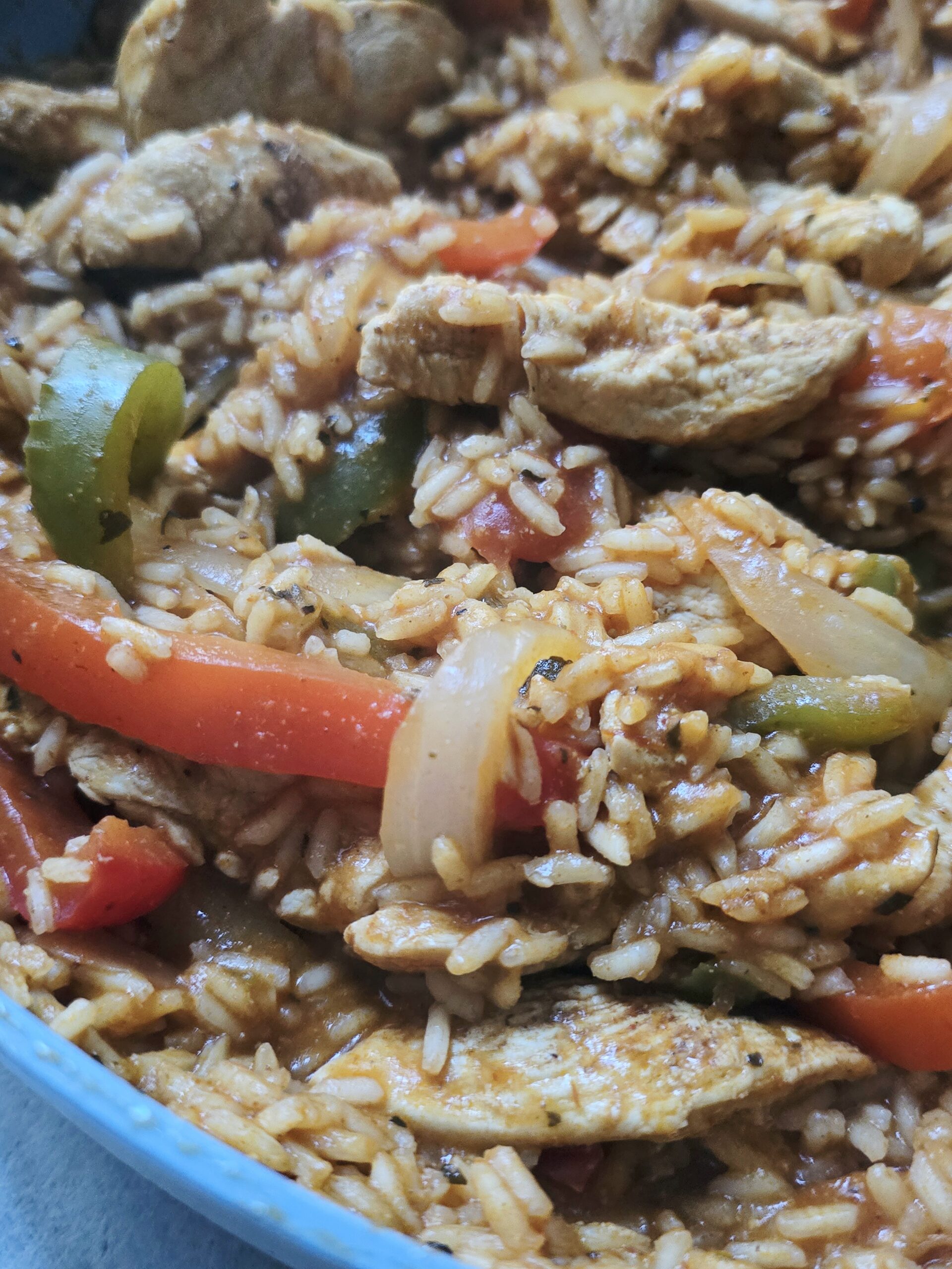 one pan chicken fajita and rice skillet with peppers and onions