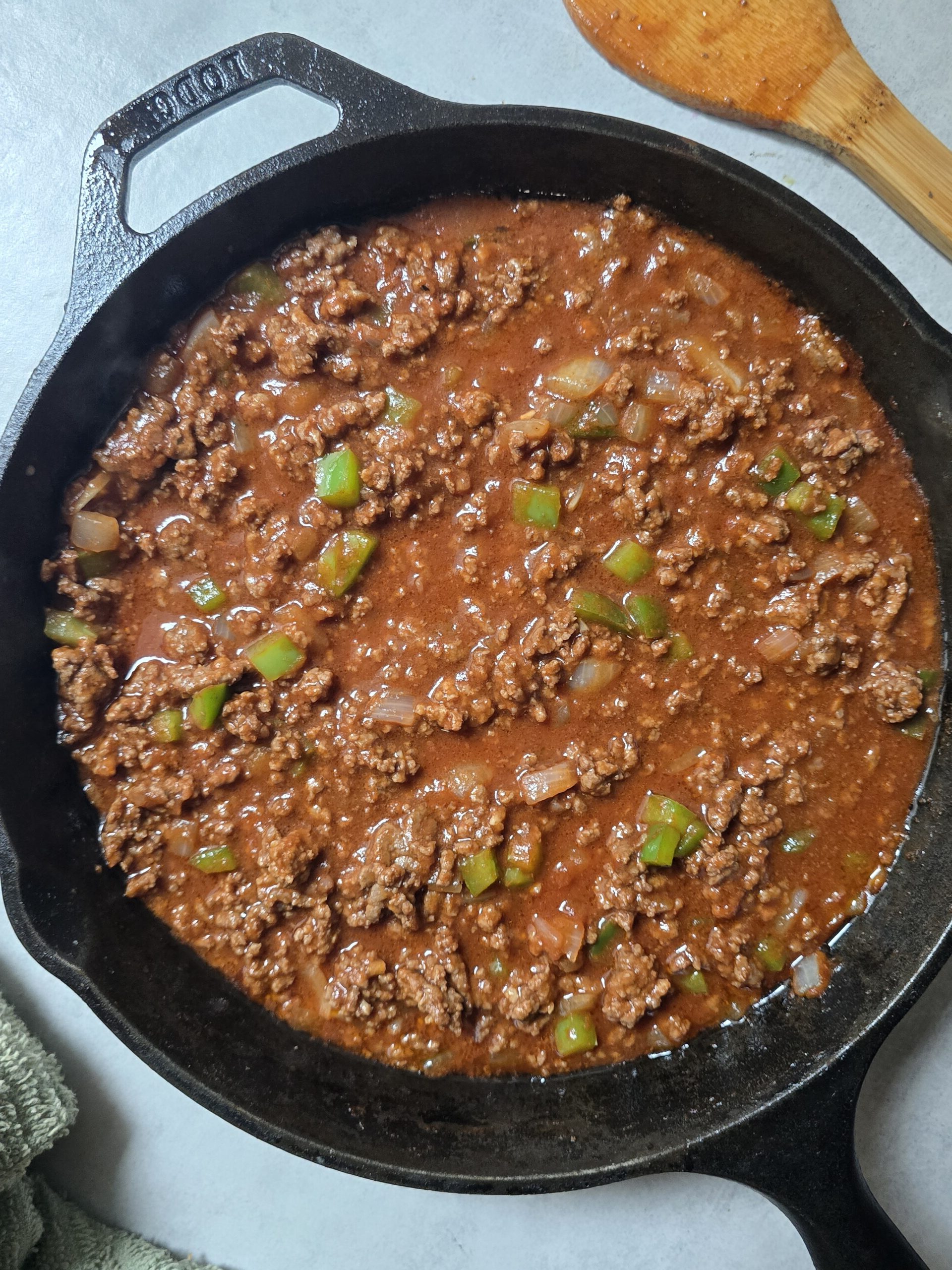 Overhead view of gluten free sloppy joes tater tot casserole with ground beef filling